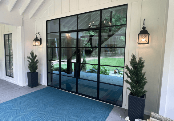This home features custom steel doors and windows. 
