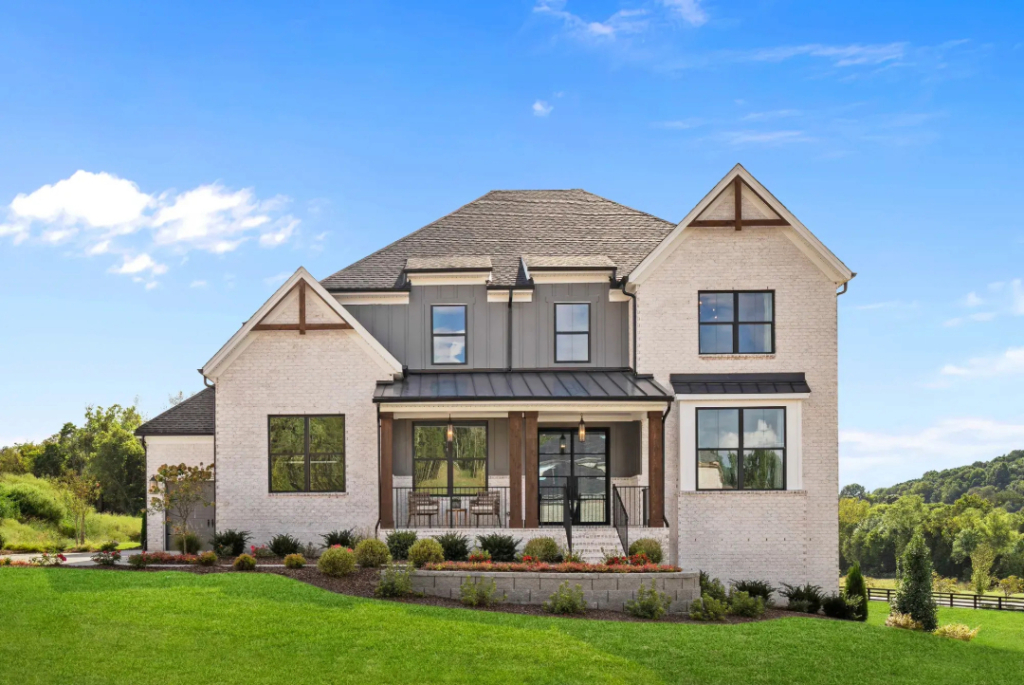Outside shot of a house with iron lion windows and doors